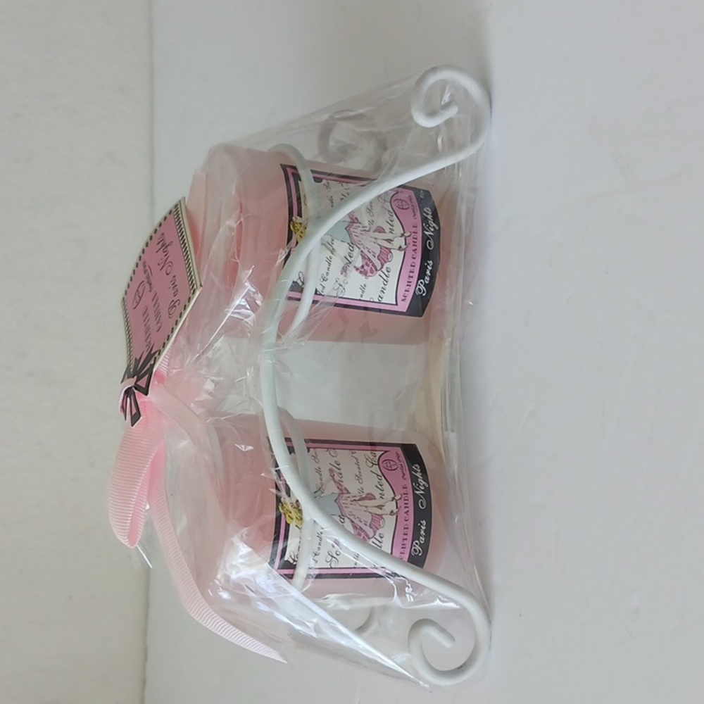 Pair of candles on stand